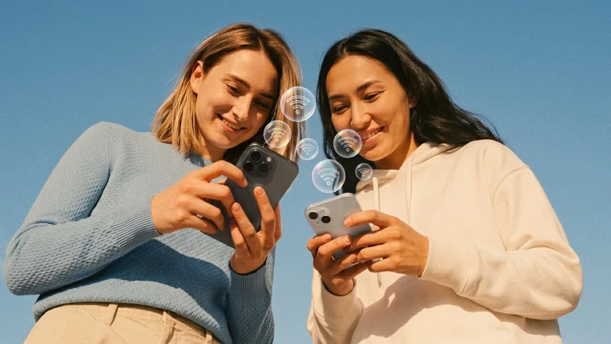 Two travellers, two phones, both online